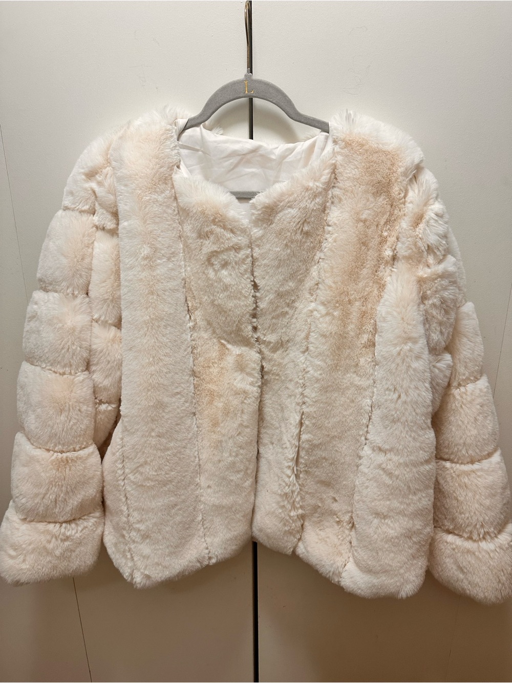 White faux fur coat